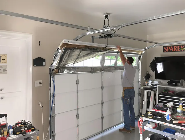 Garage door section replacement by Warwick Garage Door Repair in Warwick