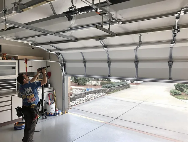 Garage door track repair service by Warwick Garage Door Repair in Warwick